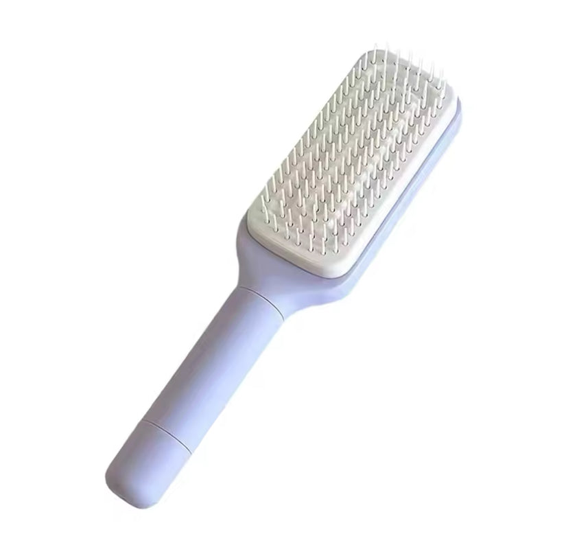 💆‍♀️ Ротуючий масажний гребінець із довгою ручкою